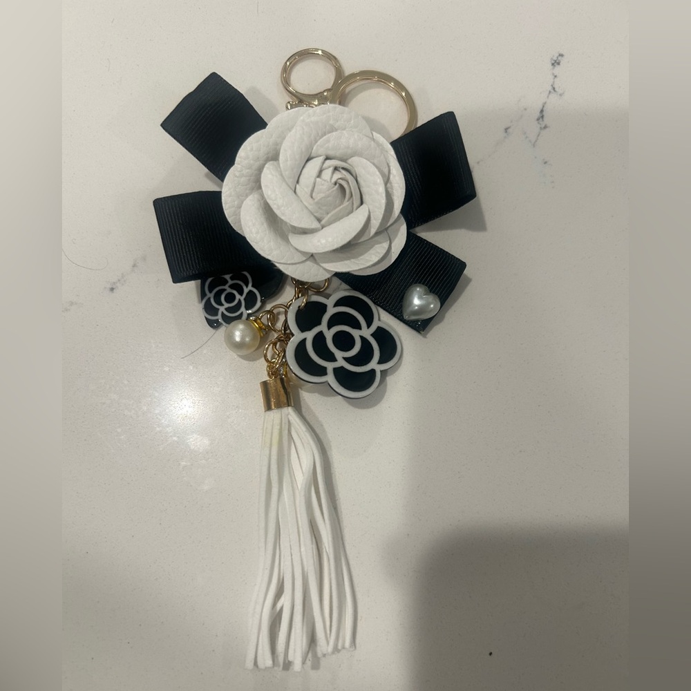 3/$30***Camellia Black and White Bag Charm/Keychain NWOT